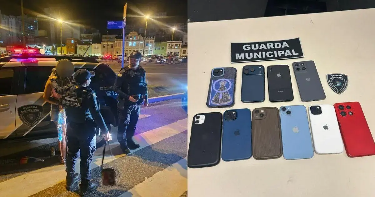 Duas mulheres sendo abordadas por guardas municipais ao lado de um carro da polícia e celulares apreendidos em uma mesa.