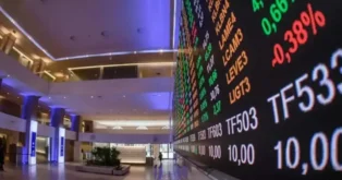 Painel de resultados de ações em ambiente de bolsa, com informações financeiras e percentuais destacados.