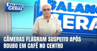 Apresentador de programa de TV ao fundo com texto legível sobre câmeras que flagraram suspeito após roubo em café.